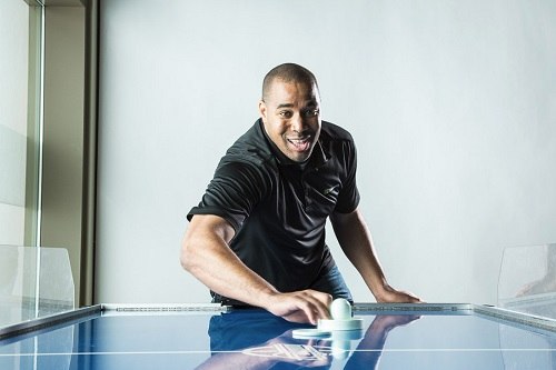 Man Playing Air Hockey